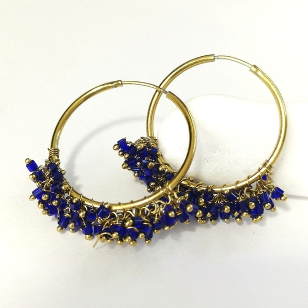 Vintage hoop earrings in gold tone and royal blue crystals